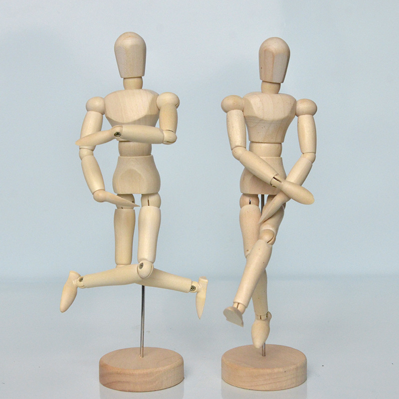 The 8 inch wooden man model has wooden joints - handcrafted wood
